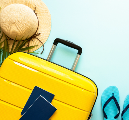 The image shows a yellow suitcase, blue flip-flops, a straw hat, and two dark blue passports on a light blue background.